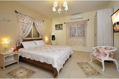 וילה רוגע בבוסתן - חדרי הוילה